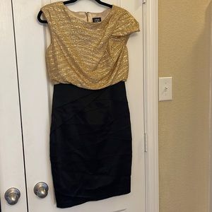 Jax dress Size 4, black and gold color invisible zipper One drop shoulder sleeve